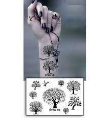 Modèle de tatouage tete de mort et fleurs en couleur. Tatouages Temporaires Arbres Tibetain Tarawa Piercing