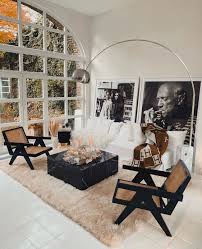 This Space Is Symmetrical Because Of The Chairs On Either Side And The Paintings On The Back Wall House Design House Interior Cheap Home Decor