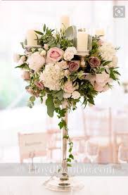 Incorporating Candle Light Wedding Flower Arrangements Wedding Table Flowers Wedding Flowers
