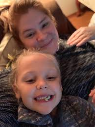 Dog picking up kids from school