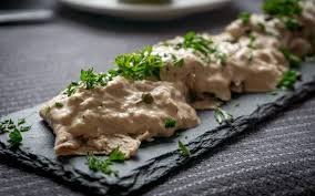 In scott conant's version of vitello tonnato, succulent chilled veal is smothered in a tangy, creamy sauce made with canned tuna, egg yolks, anchovies and capers. Vitello Tonnato A Classic Of Italian Cuisine