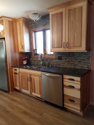 Natural Hickory Cabinets With Silver Pearl Granite Countertops In 2020 Hickory Kitchen Cabinets Hickory Cabinets Rustic Kitchen Cabinets