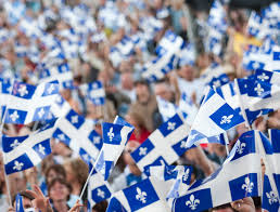 Fière de son identité basque, toute la population est habillée en rouge et noir, aux couleurs de la cité luzienne. Bonne Fete Quebec Le Lac St Jean