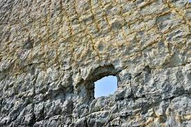Beautiful And Unusual Rock With A Hole Flat And Vertical Rocky Surface  Texture Her Name Sail In Russian Language Parus Stock PH๏τo - Download  Image Now - iStock