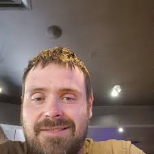 CA555 , 555 timer made by RCA in a non DIP package. Probably 50 years old  now