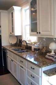 30 White Cabinets Brown Countertops In 2020 Kitchen Cabinets And Granite Kitchen Renovation Brown Granite Countertops