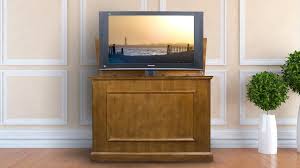 Motorized flat screen mounts add a professional touch to any television installation. 7 Best Tv Lift Cabinets For End Of Bed Or Anywhere Woman S World