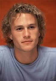 He looks heartbreaking in this look and many people probably admire him for just his curly perm hair. Heath Ledger Young Celebrities Celebrities Who Died Celebrities Male