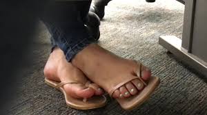 Crazy voyeur films his co - workers attractive feet in flip flops at work  - Feet9