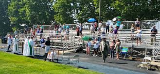 Mass at football field scores touchdown with parishioners