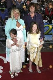 Each episode will feature laurence as he helps lottery winners find and buy their perfect home in the united kingdom and europe. Photos And Pictures London Laurence Llewelyn Bowen With Wife And Children At The London Premiere Of The Film Shrek 2 Held At The Empire Leicester Square 28 June 2004 Paolo Pirez Landmark Media