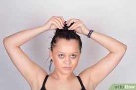 When you tie your hair back it stretches up to a third of its length causing tension breakage, says rob. 6 Ways To Style Wet Hair Wikihow