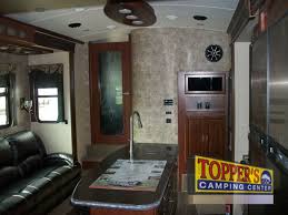 Tesla fifth wheel toy hauler. Evergreen Tesla 3950 Fifth Wheel Toy Hauler Deal Of The Year Topper S Camping Center