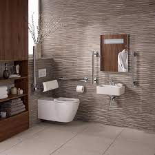 Handicap bathroom design determines the toilet seat must be between 17 and 19 inches from the floor. Disabled Bathrooms Accessible Bathrooms From Doug Cleghorn