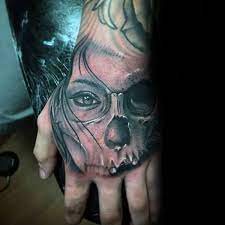 Day of the dead hand tattoo hand tattoos sugar skull. Pin On Hand Tattoos