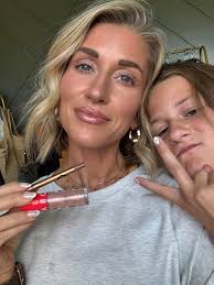 When the fashion matches the makeup and the nails. 🎀 I am loving this  Exotic Plum lip and my new zip from Tuesday's live show! Anyone else snag  anything from the lives