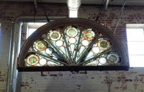 The stained glass window features cathedral textured and smooth glass accentuated with jewels. Antique Arched Peacock Stained Glass Transom Window Glass Art Installation Glass Art Stained Glass Transom