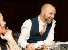 George the Mouse in a log pile house