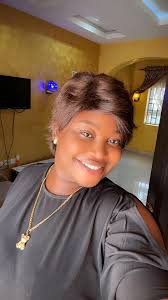 Busola Betty Adenikinju added a...