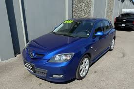 Image result for Electric Blue 2007 Mazda3