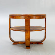Maybe you would like to learn more about one of these? An Art Deco Style Walnut Coffee Table Later Part Of The 20th Century Bukowskis
