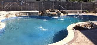 Essentially, there are water lines in your pool deck (flush with the surface) that shoot out streams of water into the pool. Long Island Pool Designs Freeform Pools Pool Designs Pool Patio