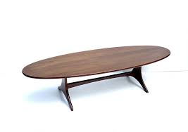Coffee tables have gone a long way from the old dark wood rectangles to almost any shape and size you can imagine. Mid Century Heywood Wakefield Surfboard Coffee Table Lot 67 Antique Factory