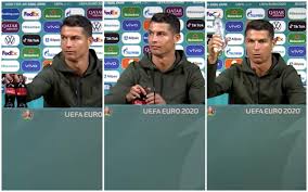 Cristiano ronaldo removes bottles of coca cola from press conference table. Cristiano Ronaldo Removes Coca Cola Bottles And Recommends Drinking Water Video