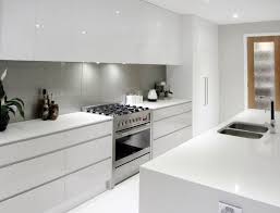 White Cupboards No Handles Light Grey Splashback All In Kitchen Design Kitchen Interior Home Decor Kitchen