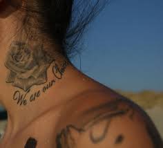 A rose tattoo on the chest. 45 Words Neck Tattoos