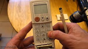 Learn how you can keep your air cond running smoothly with these turning it to fan mode before your head out can help dry the unit completely. How To Setup Time To Mitsubishi Air Conditioner Remote Control Youtube