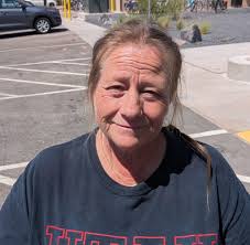 How can a 56-year-old widow find an affordable room or apartment to rent or  share in St. George?