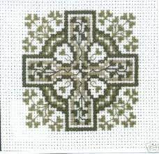 Stitched on 28 count summer khaki cashel linen with dmc floss, needlepaint thread (or use dmc 3743, 160, 161, 158, 823, 939, 927, 926, 502, 501, 500, 924), rainbow gallery petite treasure braid and mill hill. Celtic Cross Stitch Patterns Celtic Cross Stitch Cross Stitch Patterns Cross Stitch