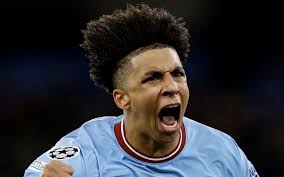 City's Rico Lewis, 17, receives standing ovation after record-breaking  Champions League goal