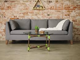 Lift each corner in turn and slide one piece of pvc pipe onto the bottom of the each table leg. How To Make A Pvc Pipe Coffee Table Danmade Watch Dan Faires Make Reclaimed Wood Furniture Hgtv