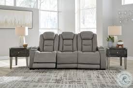 Shop our low prices on living room furniture that fits your style. The Man Den Gray Leather Power Reclining Sofa With Adjustable Headrest From Ashley Coleman Furniture