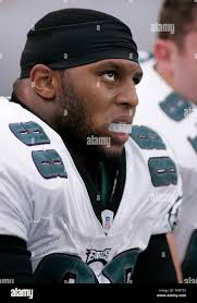 Philadelphia Eagles defensive tackle Mike Patterson looks up at the  scoreboard late in the fourth quarter against the Denver Broncos at Invesco  Field at Mile High Stadium in Denver October 30, 2005.