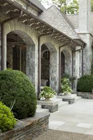 Garden Loggia In Gravel Courtyard With Limestone And Cherokee Stone Detail Dream House Exterior Limestone House House Exterior