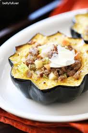 This Stuffed Acorn Squash Is Filled With A Delicious Sausage And Apple Mixture It S Wonderful As A Side Dish Or A Complete M In 2020 Acorn Squash Recipes Recipes Food