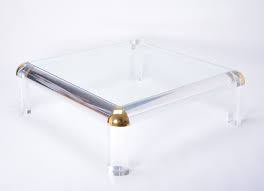 Elements of hollywood regency and modern design intermingle to create this timeless look. Large Vintage Lucite Brass Square Coffee Table 99821