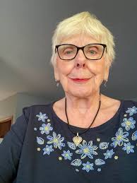 Visiting hometown, showing off shirt