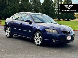 Image result for Electric Blue 2007 Mazda3