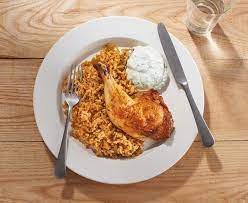 This Chicken And Rice Is Perfect Home Cooking With Prison Roots In 2021 Baked Dishes Home Cooking Favorite Dish