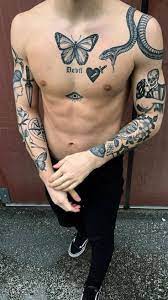 Hottest And Trendiest Body Tattoos Darlingnaija Tattoos Small Chest Tattoos Badass Tattoos