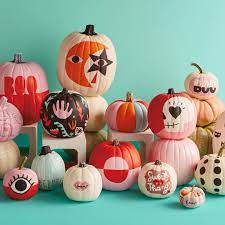 A super fast diy project, paint you pumpkin in black and paint a white ghost over it. 30 Creative Ways To Paint Your Pumpkins That Are Just As Festive As Traditional Jac Diy Halloween Decorations Halloween Pumpkins Painted Halloween Decorations