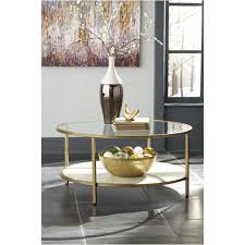 Coffee table and smaller end table with laminated walnut tone wood make offer city furniture wood and glass coffee table with gold metalic framing. T294 8 Ashley Furniture Britzwald Round Cocktail Table