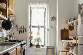 Once you've got the tops of your cabinets clean, there's a cheap kitchen staple you can use to keep them that way: 4 Garbage Can Tricks Everyone Should Try For A Better Smelling Kitchen Apartment Therapy