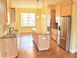 Knotty Alder Cabinets With Clear Coat No Stain Granite Stained Concrete Floors Concrete Stained Floors Knotty Alder Cabinets Alder Cabinets