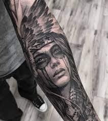 Native americans have sported tattoos for centuries. Native American Woman Tattoo In Black And Grey On The Sleeve Made By John Hudic Travel Tattoo A Tattoo Indianer Girl Frau Gesicht Tattoo Vorlagen Frauen