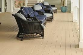 Traditional cathedral wood grain patterns and a soft, solid color palette complement a wide range of homes' exteriors. Azek Harvest Collection Decking